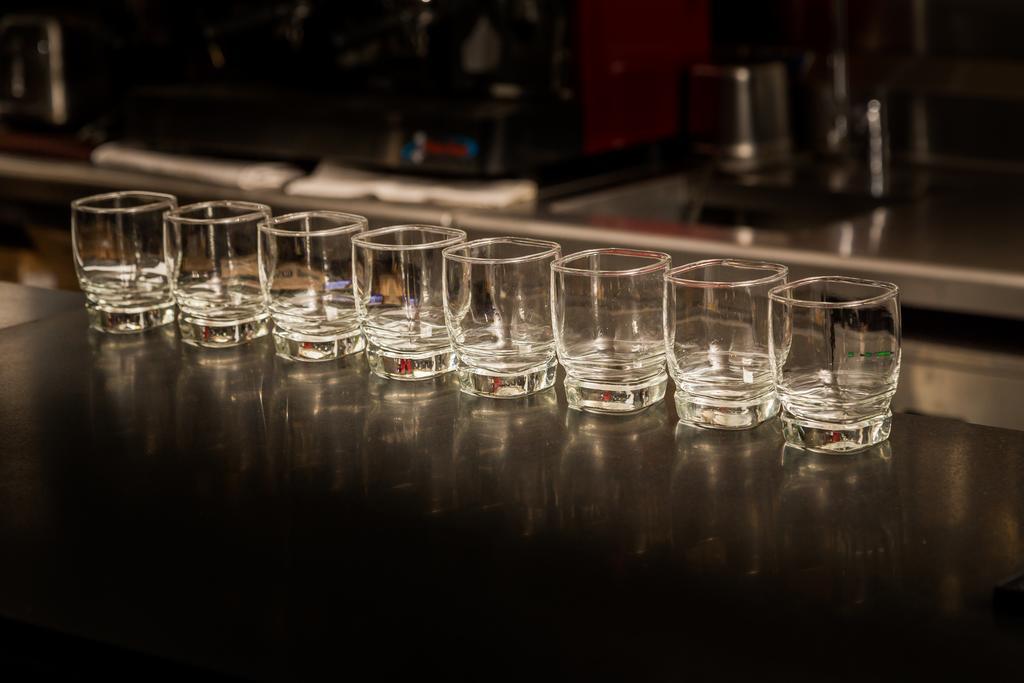 Suites Contempo Mexico City Exterior photo A row of shot glasses